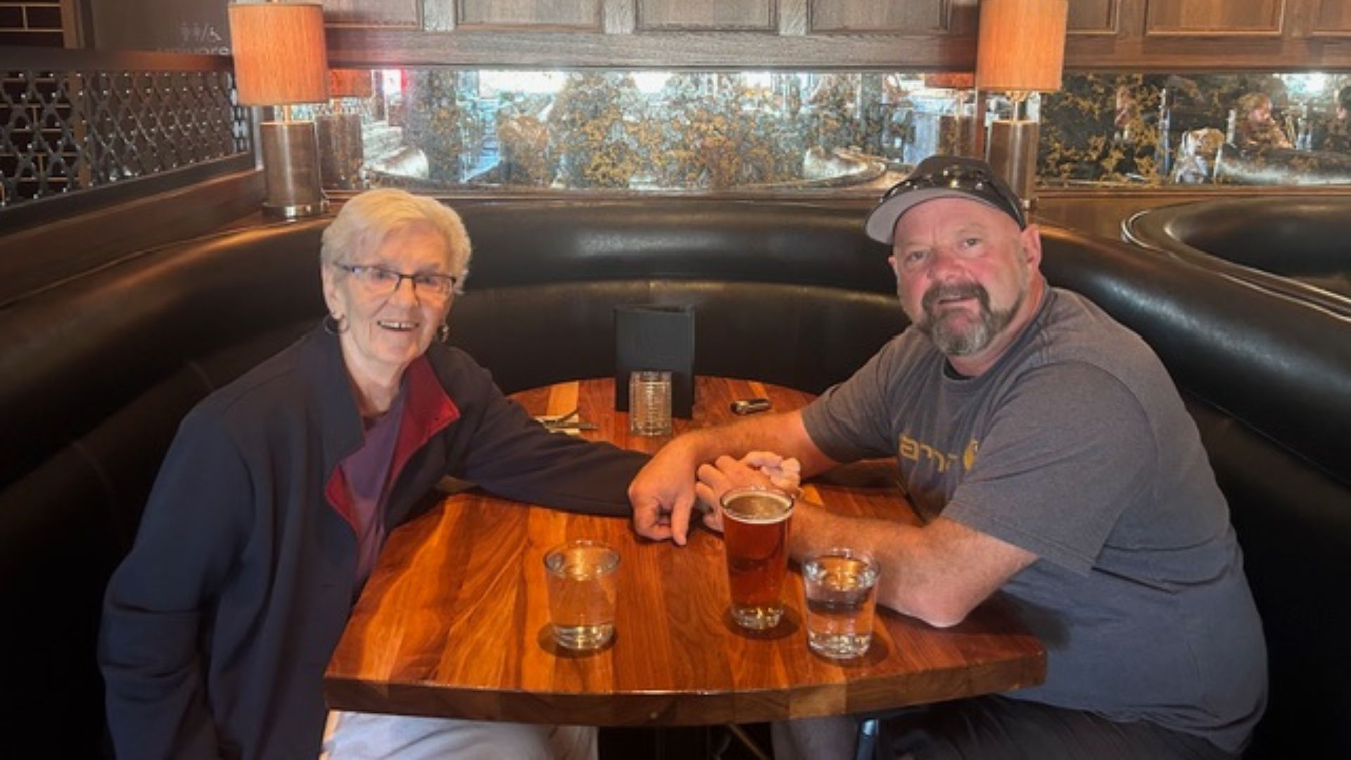 Warren Hamm sharing a meal with his aunt, a moment of genuine family connection