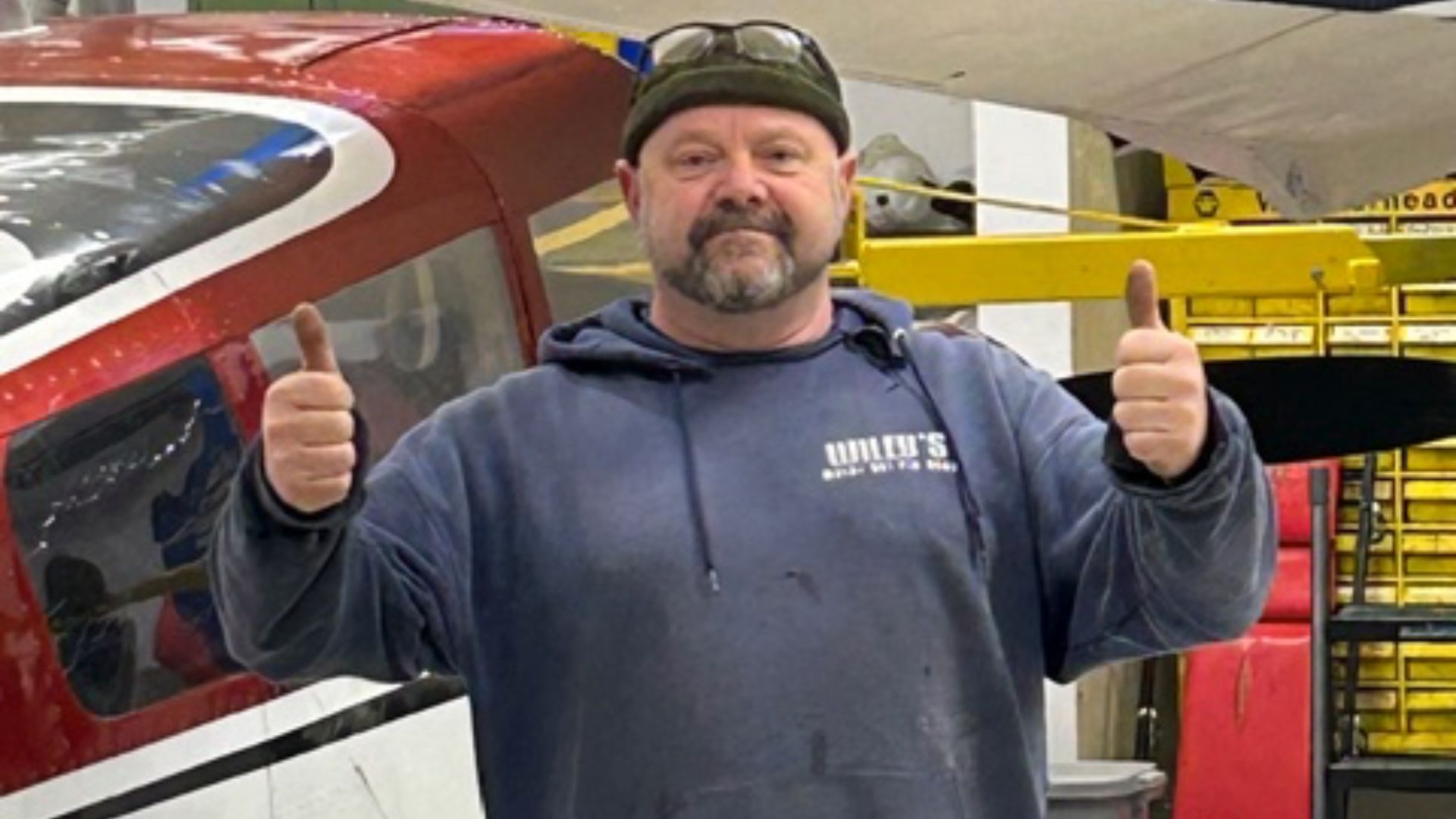 Warren Hamm happily working on an aircraft as a licensed maintenance engineer